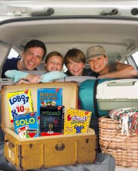 Family in car packed for vacation